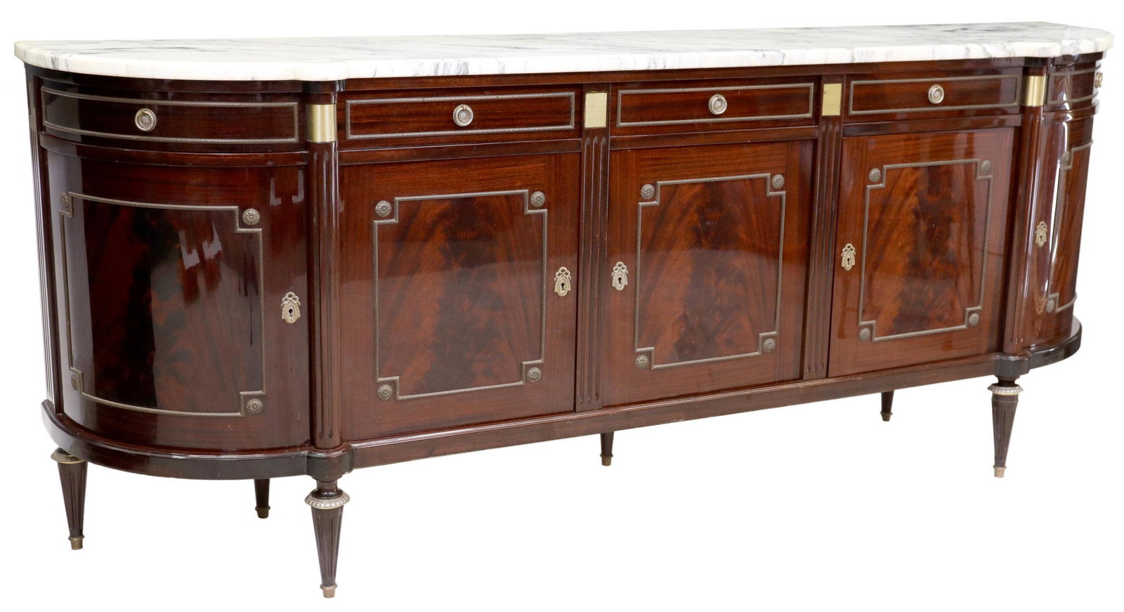 LOUIS XVI STYLE MARBLE-TOP MAHOGANY SIDEBOARD: French Louis XVI style marble-top sideboard, 20th c., mahogany case with curved ends, fitted with five drawers, over five cabinet doors, interior shelves, on tapering fluted legs, interior lighting in