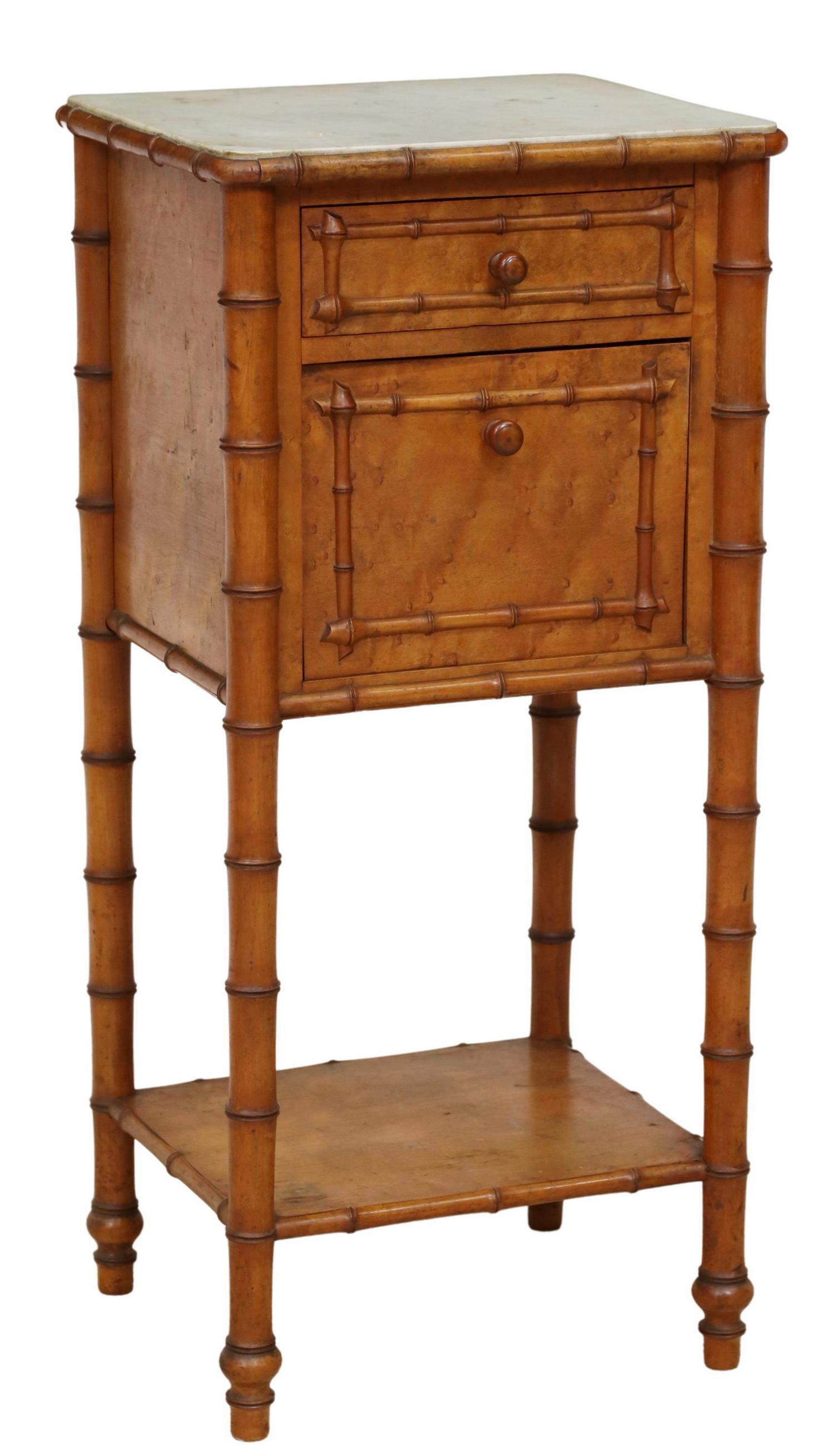 FRENCH FAUX BAMBOO MARBLE-TOP NIGHTSTAND: French faux bamboo bedside cabinet, 20th c., having inset marble top, single drawer, over drop-front cabinet, medial shelf, rising on turned supports, door panel slightly warped, approx 32 5/8"h, 15.2