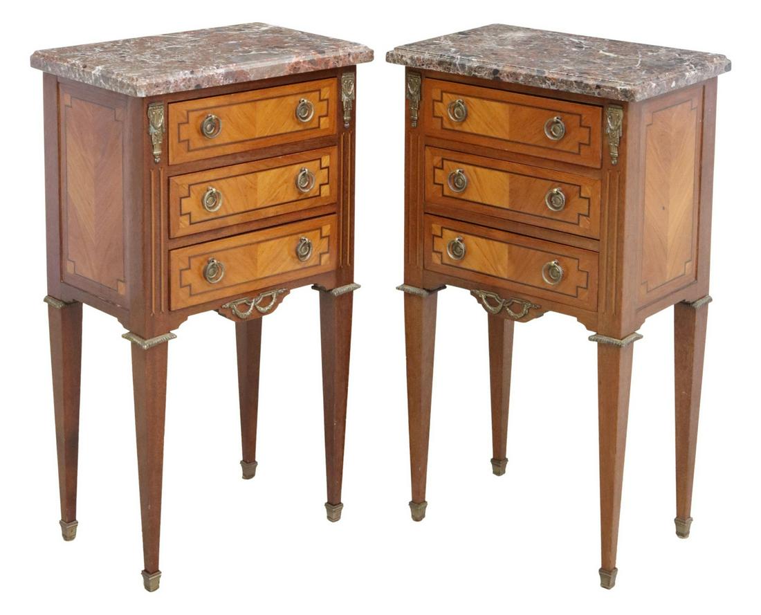 (2) NEOCLASSICAL STYLE MARBLE-TOP NIGHTSTANDS: (pair) Neoclassical style inlaid nightstands, 20th c., having marble top, over matched veneer case fitted with three drawers, with inlaid parquetry motifs, rising on squared and tapered supports, endi