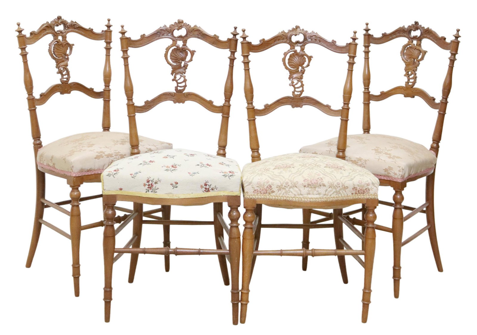 (4) FRENCH LOUIS XV STYLE WALNUT SIDE CHAIRS: (lot of 4) French Louis XV style carved walnut hall chairs, early 20th c., having pierced backsplat with scrolled foliate crest, flanked by turned finials, over padded seat in varied upholstery, ribbo