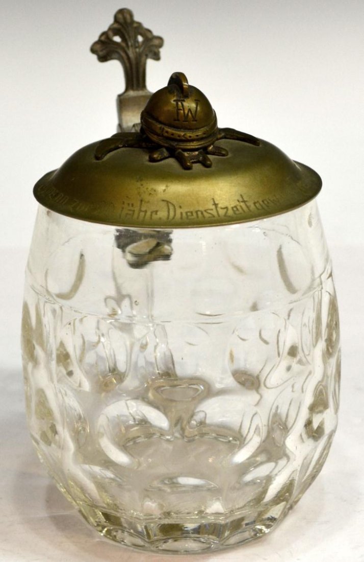 GERMAN GLASS FIREMAN COMMEMORATIVE STEIN: German round glass Sächsische Glasfabrik August Walther & Söhne or Sachsenglas stein with hinged gilt lid, commemorative for twenty years volunteer service for the fire department in Potschappel, li