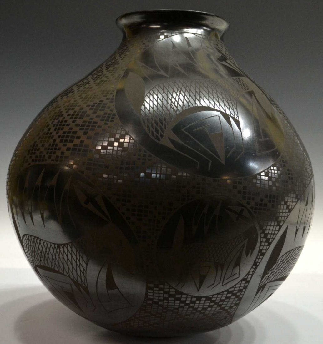 LARGE MATA ORTIZ BLACKWARE JAR, MARIO OLIVAS: Impressive and large Mata Ortiz Pueblo pottery olla by Mario Olivas, Mexico, black-on-black abstract animal and geometric motif, 14.5"h, approx. 14.5"diam; 9lbs, **Provenance: Purchased in 2005 at the