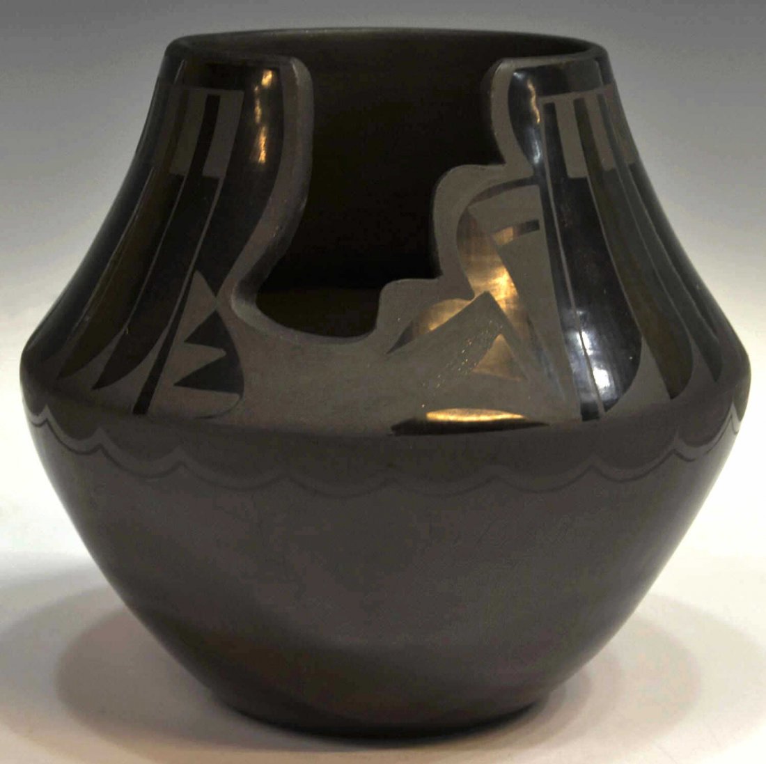 LARGE SAN ILDEFONSO BLACKWARE FEATHER POT: Southwest San Ildefonso Pueblo uniquely shaped pot, Martha Appleleaf, (b. 1950), grandniece to Maria Martinez, black-on-black feather motif, signed underfoot, some small areas of wear, 8.75"h, 9.5"dia