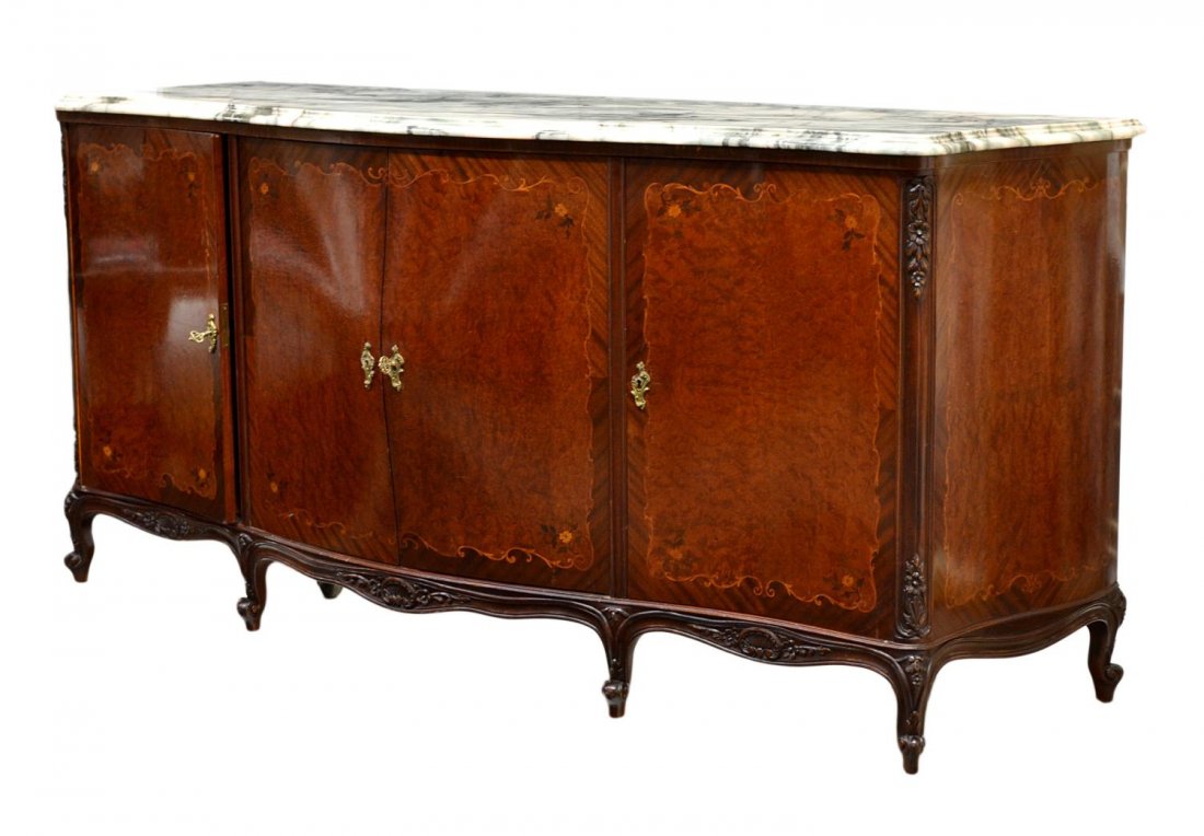 ARGENTINIAN MARBLE TOP SIDEBOARD, SILVER CHEST: Marble top sideboard, Argentina, 1930, shaped marble over a four door sideboard, the center two doors opening to reveal a four drawer silver chest, all rising on short scrolled feet, 39.5"h, 86"w, 25.