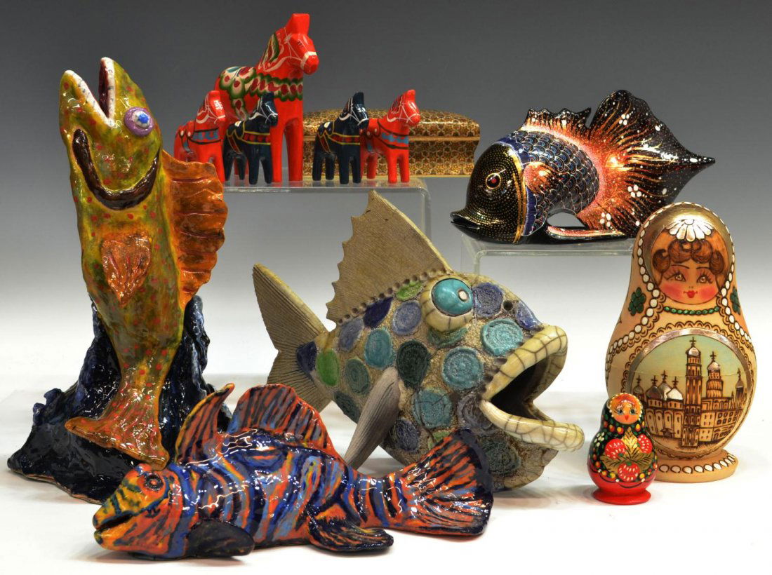 (12) COLLECTIBLES LOT RUSSIAN FISH & NESTING DOLLS: (lot of 12) Assorted collectibles from various countries, including Russian Matryoshka nesting dolls, pottery fish, Swedish painted wood horses, heavily gilded box in an arabesque pattern, etc., large