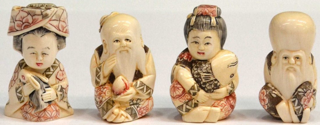 (4) SIGNED CARVED POLYCHROME IVORY NETSUKES: (lot of 4) Carved polychrome ivory netsukes: (1) female figure a holding fish; (1) female figure holding a rabbit; (2) male longevity figures, each signed underfoot, largest: 2.1/8"h, .5lb Start Price