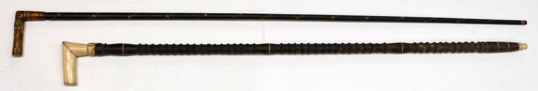 (2) ANTIQUE WALKING CANES, IVORY HANDLES: ***This Lot Will Not Be Shipped Internationally*** (lot of 2) Walking canes: (1) antique walking stick, carved Ivory handle with inlaid ivory accents on ebony stick, 40"l, 3.5"w; (1) antique Anglo-Ind