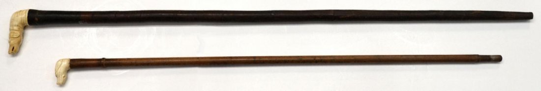 (2) ANTIQUE WALKING STICKS, IVORY HOUND HANDLES: ***This Lot Will Not Be Shipped Internationally*** (lot of 2) Walking canes: (1) antique Anglo-Indian walking stick, the ivory handle carved as a dog head, 36.5"h, 2"w,; (1) antique Anglo-Indian walki