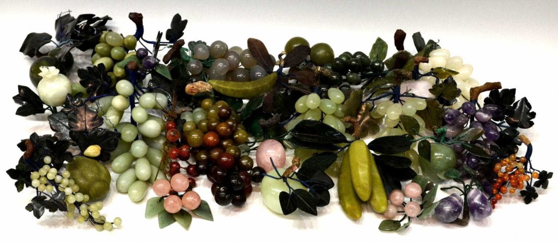 HUGE COLLECTION CHINESE CARVED JADE, STONE FRUIT: (lot) Large collection of Chinese hardstone fruits of carved jade, carnelian, amethyst etc., examples include grape clusters, bananas, peaches, apples and more, overall some blemished/chips with age, 