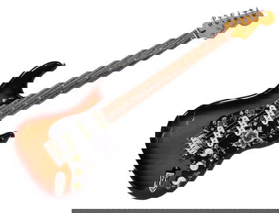 FENDER STRATOCASTER 'PARTSCASTER' SUNBURST: Fender Stratocaster "Partscaster" electric guitar in sunburst finish. Fender body, Fender Pao Ferro neck, Fender Pure Vintage '65 pickups, Fender Deluxe Locking Tuners, Tusq saddles. Floral pickguard.