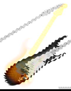 FENDER 75TH ANNIV. COMMEMORATIVE STRATOCASTER: 2-Color Bourbon Burst, Fender 75th anniversary commemorative American Stratocaster, unplayed in Fender hard case with original documentation / accessories. Custom Shop "Fat 60's" pickups, pearloid loc