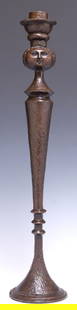 SERGIO BUSTAMANTE (B.1949) BRONZE FACE CANDLESTICK: Patinated bronze candlestick, Oval Face, signed at base Sergio Bustamante (Mexican, b.1949), numbered 43/ 250, approx 20.75"h, 4.25"diam, 6lbs Start Price: $150.00