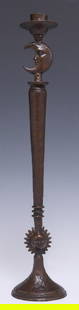 SERGIO BUSTAMANTE (B.1949) SUN & MOON CANDLESTICK: Patinated bronze candlestick, Sun and Moon, signed at base Sergio Bustamante (Mexican, b.1949), numbered 77/ 250, approx 16.75"h, 3.25"diam, 3lbs Start Price: $150.00