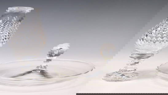2) STEUBEN TEARDROP CANAPE & WATERFORD FAIRY LAMP: (lot of 2) Crystal table articles, including: (1) Lloyd D. Atkins (American, 1922-2002) for Steuben "Teardrop" canape service dish, approx 4 3/8"h, 11"diam, (2) Waterford 'Alana' pattern hurricane fai