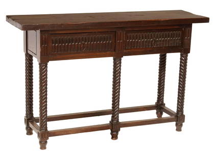 SPANISH BAROQUE STYLE CARVED CONSOLE TABLE: Spanish Baroque style console table, 20th c., having rectangular top over two scoop carved drawers, rising on spinal legs joined by box stretcher, approx 29.5"h, 47.25"w, 13 1/8"d Start Price: $200.00