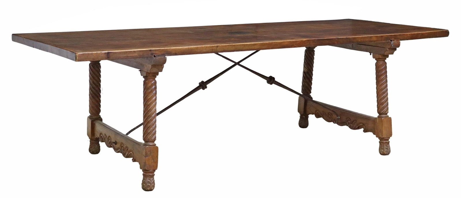 SPANISH BAROQUE STYLE OAK DINING TABLE, 98.5"L: Baroque style oak dining table, Spain, late 19th c., having rectangular top, rising on spiral supports, joined with iron cross stretcher, ending on foliate carved feet, approx 29.5"h, 98.5"w, 39"d, fl