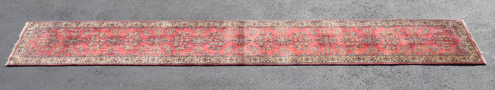 HAND-TIED INDO PERSIAN RUNNER, 17'8" X 2'7": Hand-tied Indo Persian runner, approx 17'8.5"l, 2'7"w **Please Note: All of the rugs offered in this auction would likely benefit from a professional cleaning. Estate rugs may show some wear and imper
