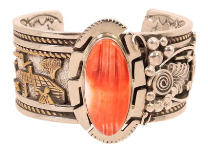 NATIVE AMERICAN STERLING & 12K GF STORYTELLER CUFF: Native American sterling silver cuff bracelet, signed RR, likely Navajo/ Dine, central bezel-set spiny oyster shell, one end with 12kt gold fill overlay storyteller scene, one end with beaded, foliate