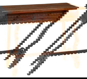SPANISH BAROQUE STYLE CARVED OAK WRITING DESK: Spanish Baroque style carved oak writing desk, late 19th c., rectangular top over two drawers, rising on ox yoke supports, split to wood at right side support, lacking a pull to one side, drawers tigh