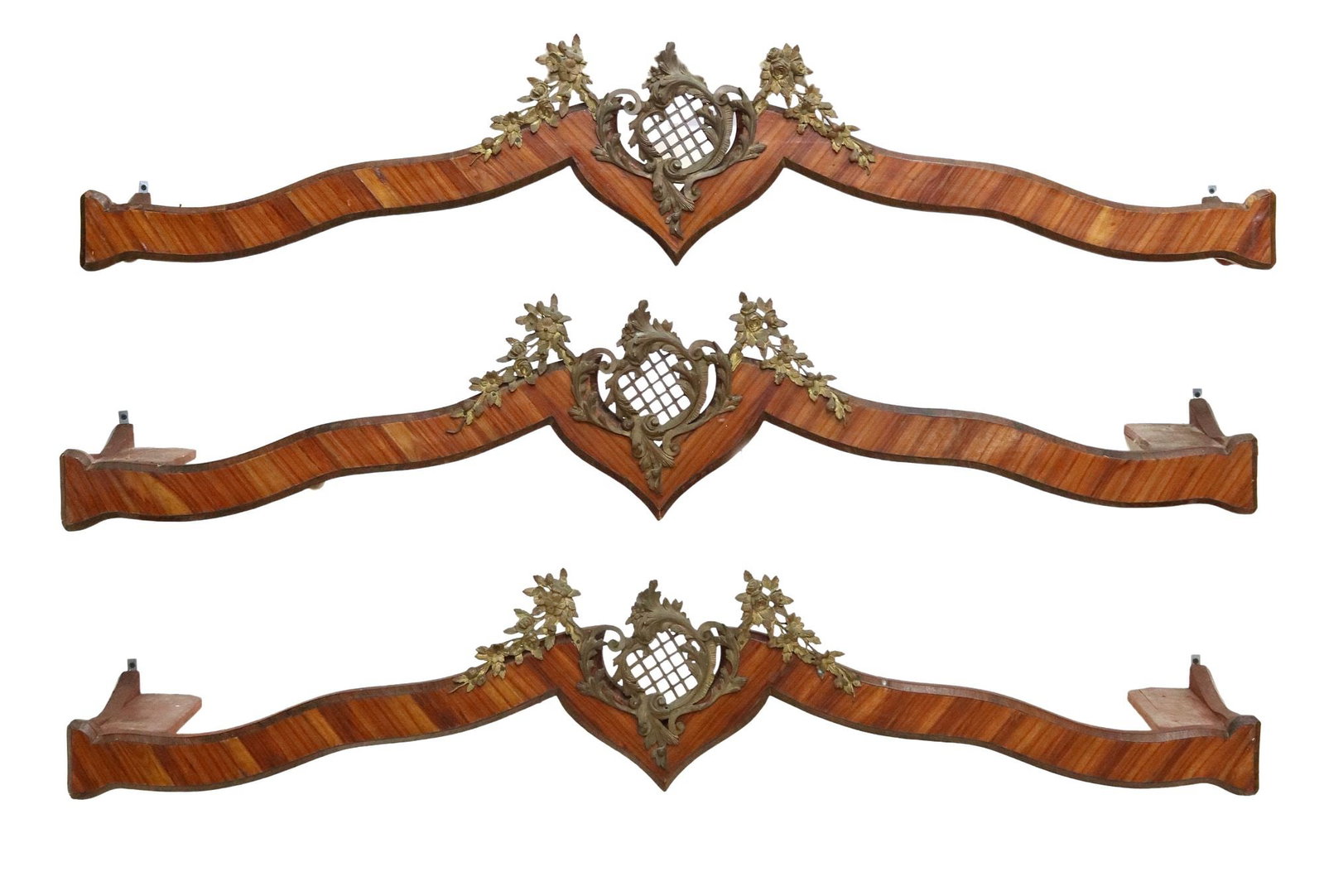 (3) LOUIS XV STYLE MAHOGANY & METAL VALENCES: (lot of 3) French Louis XV style mahogany valences/ pelmets, 20th c., having patinated metal rocaille crest, with lattice design and floral swags, approx 12 3/8"h, 62.75"w, 12.25"d Start Price: $300.0