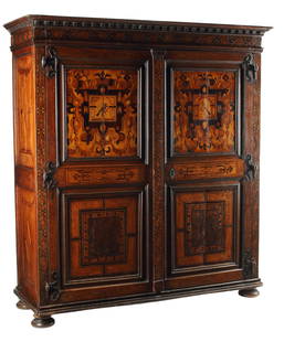 CONTINENTAL PANELED & MARQUETRY INLAID ARMOIRE: Antique Continental paneled two-door armoire, with marquetry inlay, rising on bun feet, approx 78.5"h, 71"w, 26"d Start Price: $1000.00