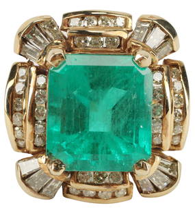 ESTATE 14K 12.12CT EMERALD & 2.18CTTW DIAMOND RING: Estate 14kt yellow gold (tested) cocktail ring, emerald, approx 12.12ct, round and tapered baguette diamonds, approx 2.18cttw, average color: K-L, average clarity: SI1-SI2, partial hallmark C?, approx