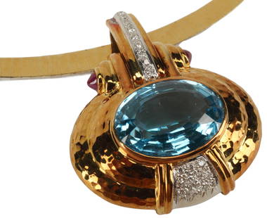 ESTATE 18KT BLUE TOPAZ & DIAMOND PENDANT NECKLACE: Estate Italian 18kt yellow gold enhancer pendant, central oval cut blue topaz, approx 21cts, accented with diamonds (set in 14kt (tested) white gold,, approx 0.25cttw, average color: G-H, average clar