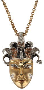 ESTATE 14KT GOLD & DIAMOND JESTER PENDANT NECKLACE: Estate 14kt yellow and white gold diamond jester pendant, on chain accented with four diamond stations, pendant hallmarked 14K 585, lobster clasp hallmarked 585, pendant: approx 1 3/8"h, 7/8"w, chain: