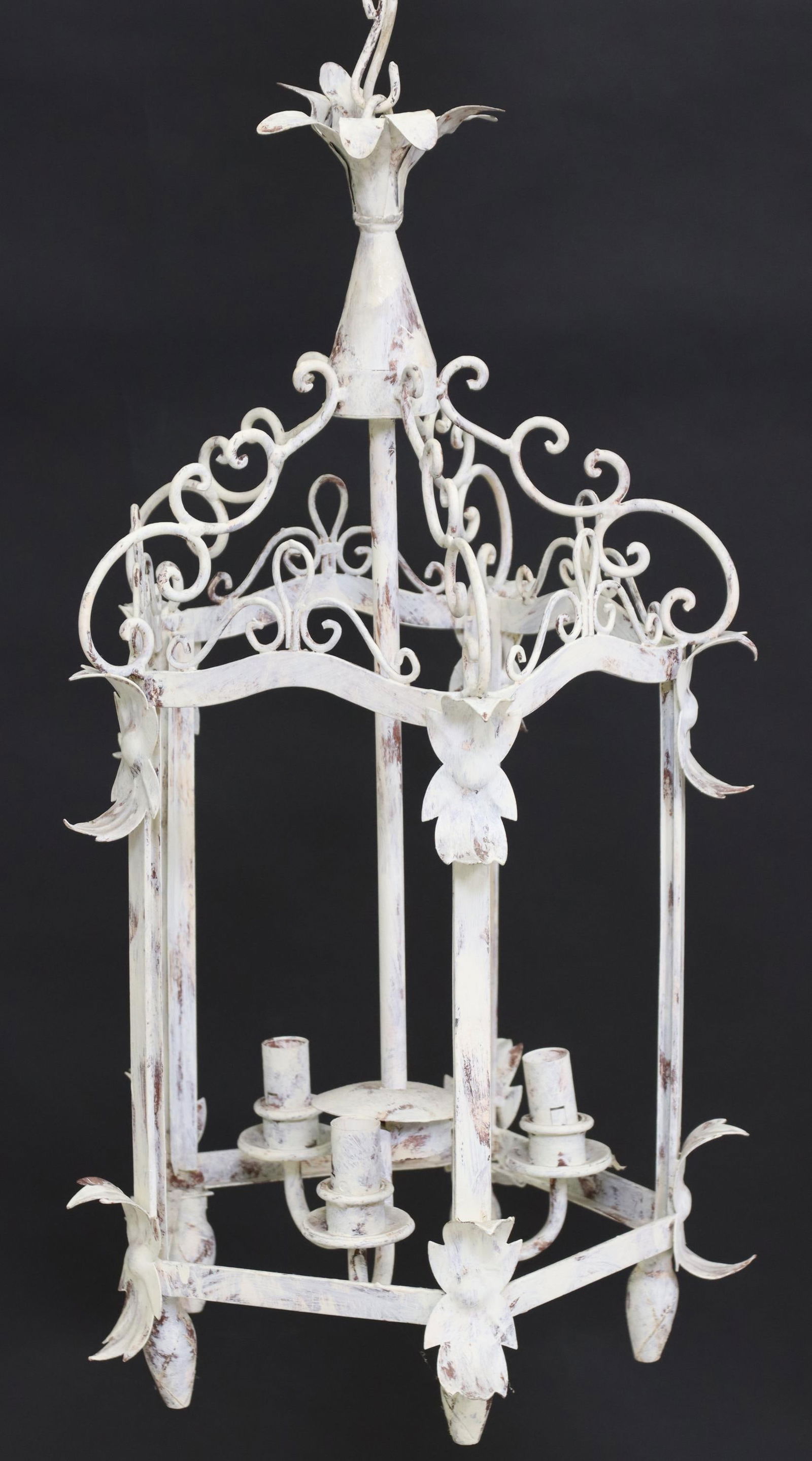 WHITE PAINTED WROUGHT IRON 3-LT HANGING LANTERN: Wrought iron three-light hanging lantern, early 20th c., having paneled frame with scrolled crest and foliate motifs, in a distressed white painted finish, three interior lights, in need of wiring, ap