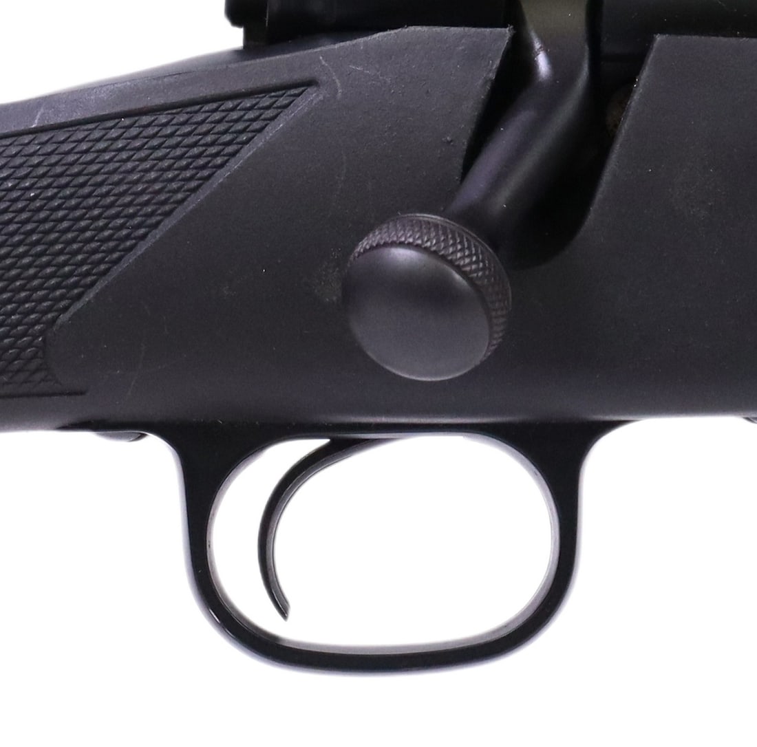 WINCHESTER MODEL 70 RIFLE, 300 WIN MAG, SCOPE: Winchester Model 70 Rifle, bolt action, .300 Win Mag caliber, 26" barrel, mounted Simmons 3-10x44 Wide Angle scope, jeweled bolt, with matched SN, black synthetic pistol grip stock with checkering, tw