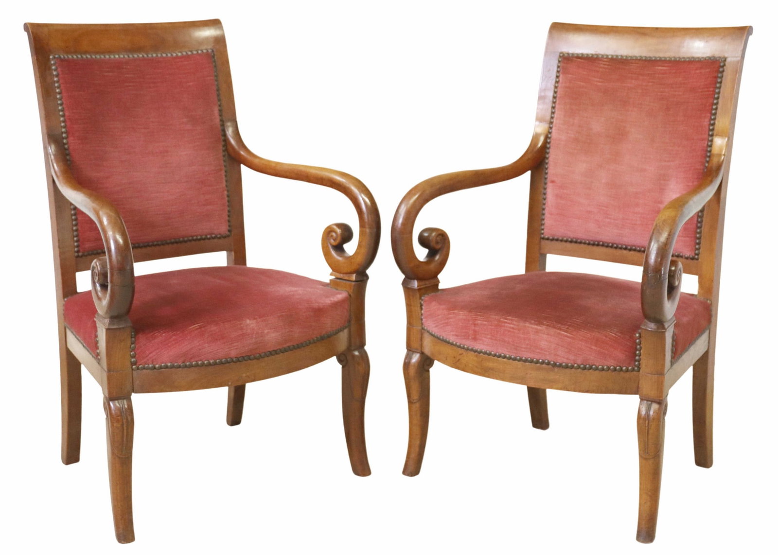 (2) FRENCH LOUIS PHILIPPE UPHOLSTERED FAUTEUILS: (pair) French Louis Philippe walnut armchairs, 19th c., in maroon fabric upholstery, with nailhead trim, scrolled arms, rising on flared legs, approx 37"h, 23"w, 19"d, seat height: 16.5"h Start Price: