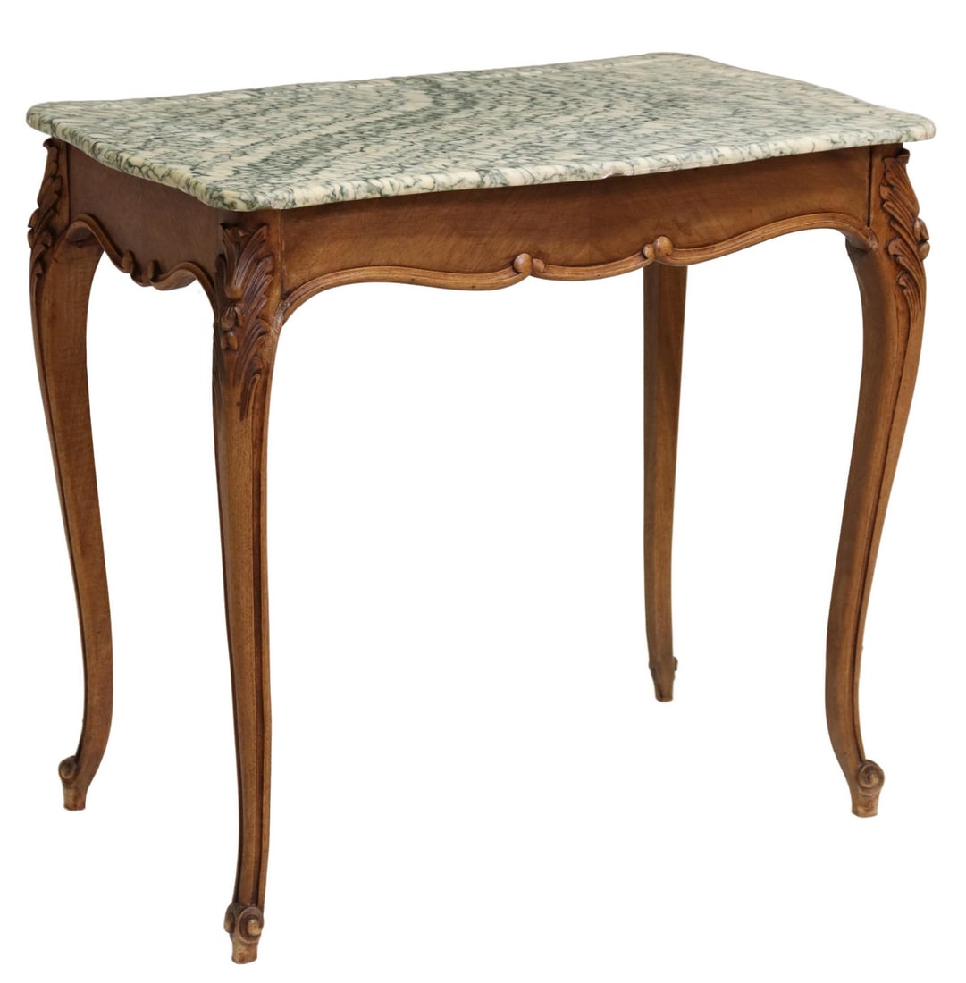 FRENCH LOUIS XV STYLE MARBLE-TOP SIDE TABLE: French Louis XV style table, late 19th c., the marble top set on the carved walnut base, rising on scroll foot cabriole legs, approx 29"h, 30.5"w, 19"d Start Price: $200.00