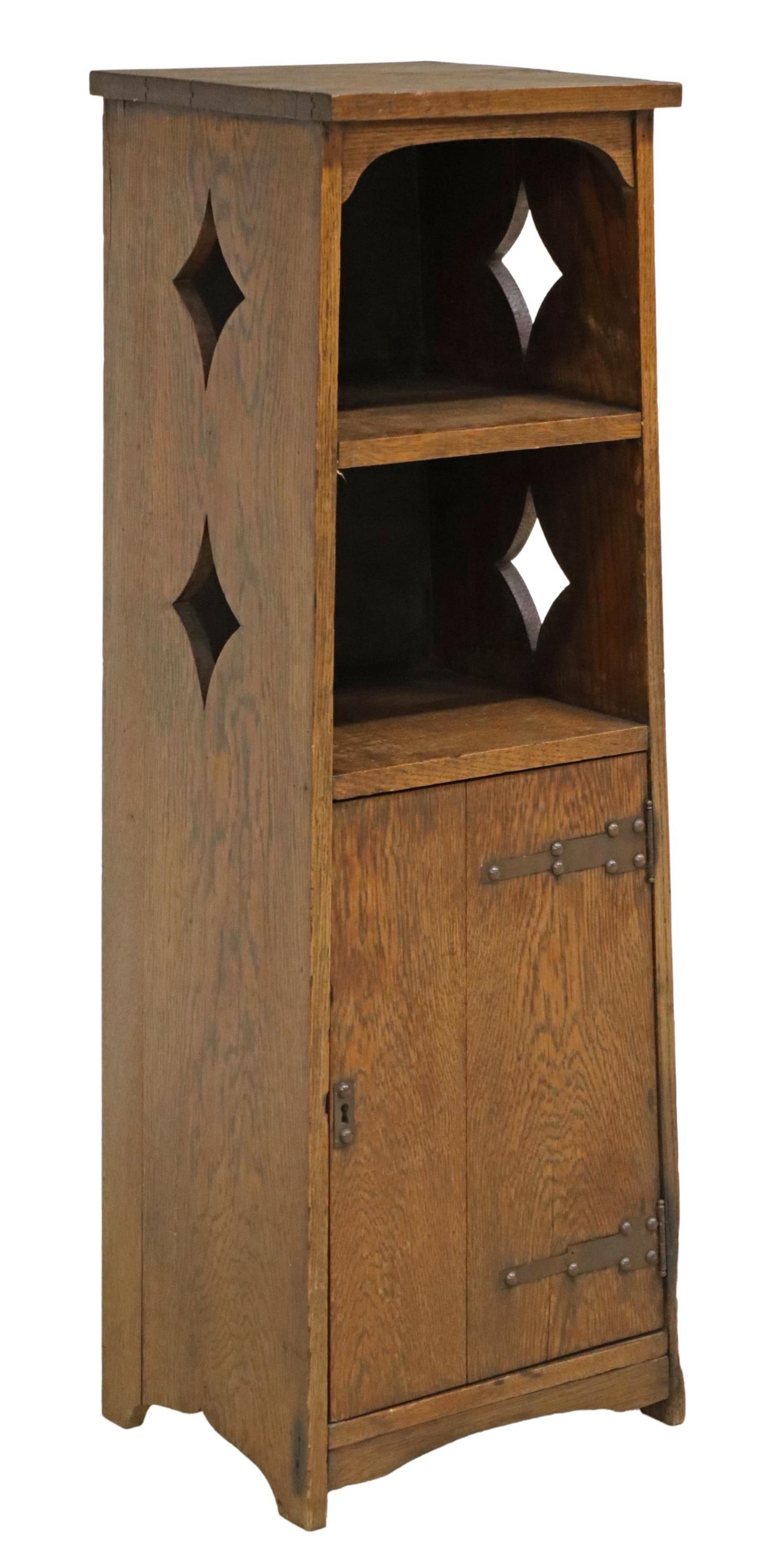 AMERICAN MISSION STYLE OAK TALL CELLARETTE CABINET: American Arts and Crafts style oak tall cellarette/ cabinet, in the manner of Lakeside Craft Shops, early 20th c., two open shelves, over cabinet door on strap hinges, shaped cut out sides, rising on 
