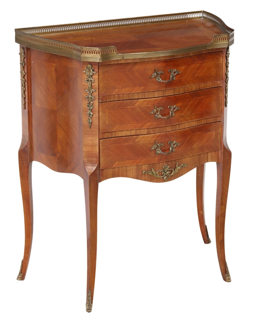 PETITE FRENCH LOUIS XV STYLE THREE-DRAWER COMMODE: Petite French Louis XV style commode, 20th c., having pierced gilt metal gallery, three drawers, rising on cabriole legs, ending in sabots, approx 29 5/8"h, 25"w, 13.25"d Start Price: $150.00