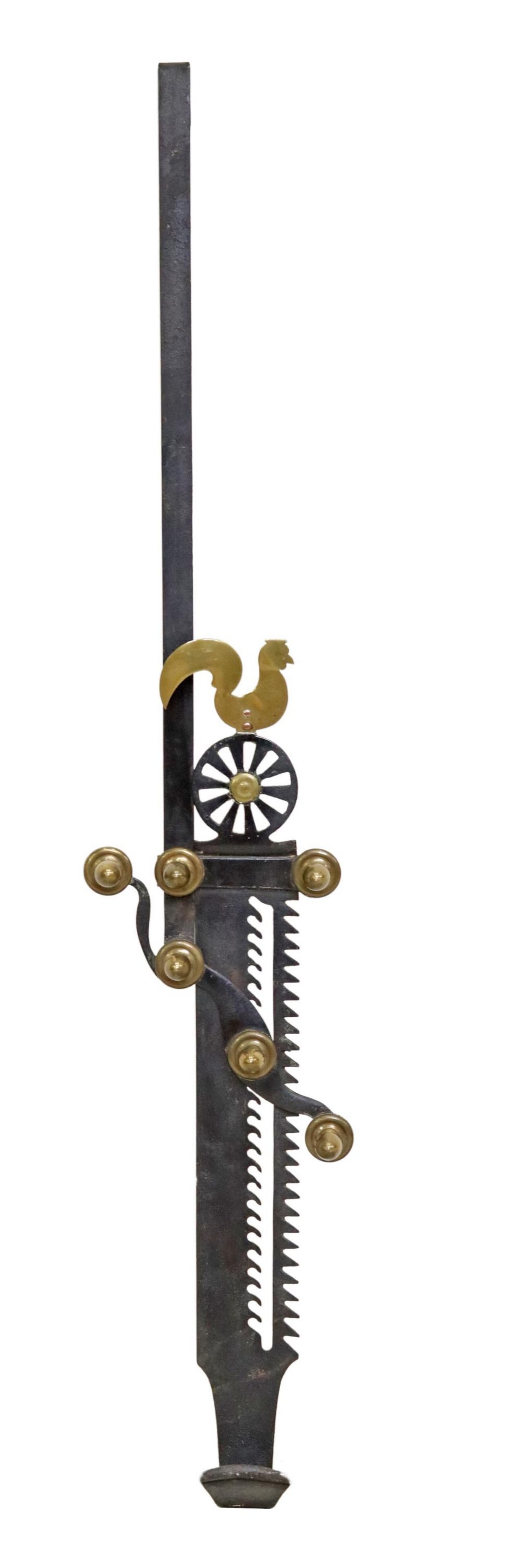 LARGE FRENCH FORGED IRON & BRASS TRAMMEL, 62"L: French wrought iron and brass trammel, with rooster perched on spoked wheel, approx 62"l Start Price: $60.00