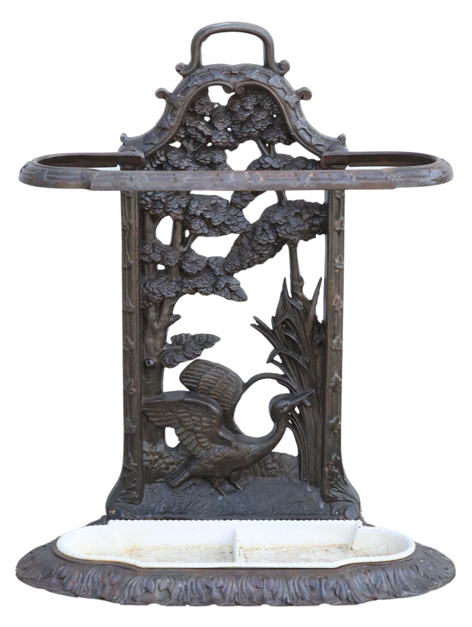 FRENCH CAST IRON UMBRELLA OR STICK STAND: French cast iron umbrella or stick stand, having pierced backplate with bird and foliate motifs, issuing shaped top rail, removable drip tray, on foliate molded base, approx 26"h, 22"w, 9"d Start Pric