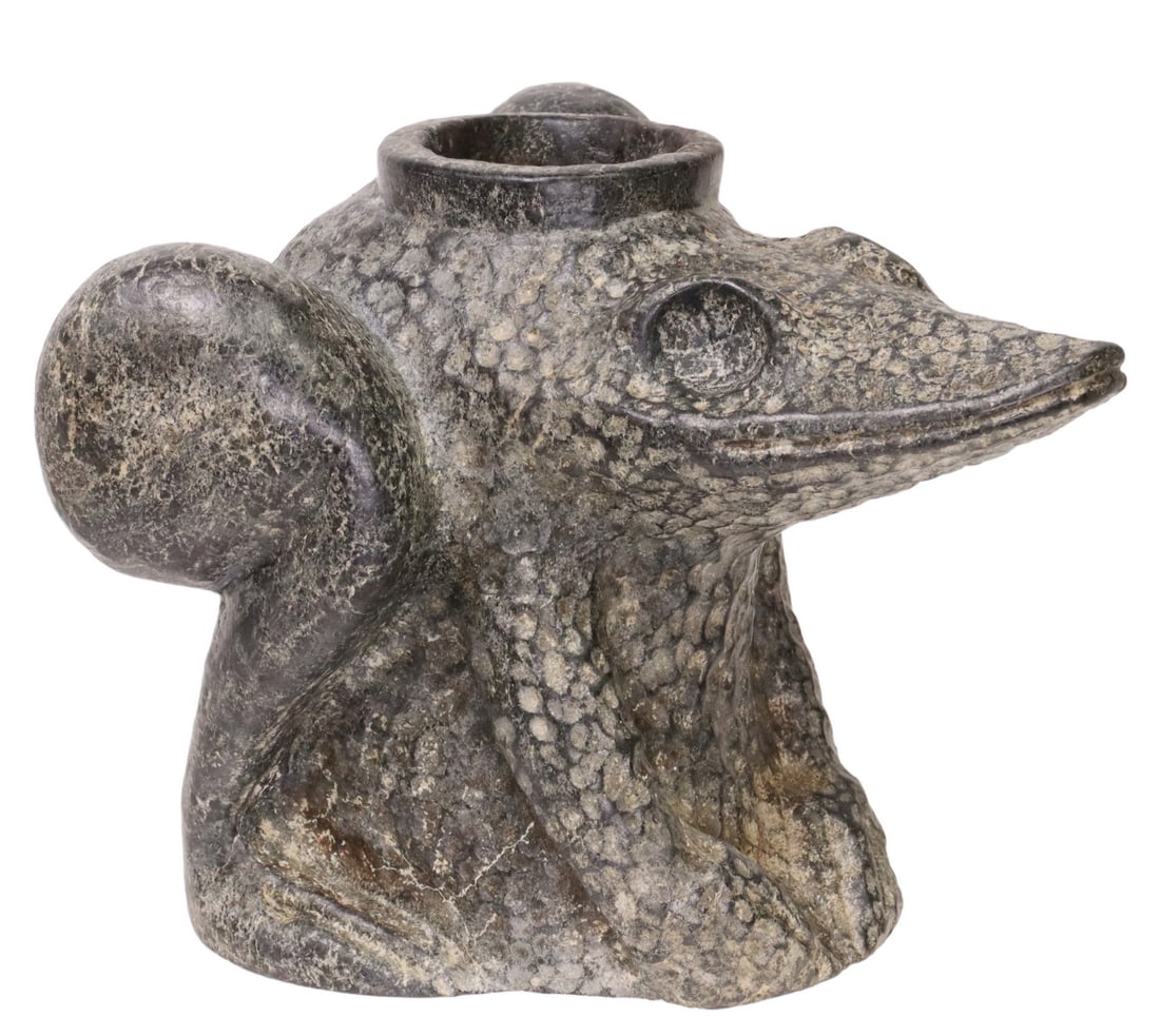 SOUTHEAST FROG EFFIGY STONE PIPE, 20TH C.: Southeast frog effigy stone pipe, possibly Cherokee, 20th c., with dimpled accents, approx 4.75"h, 7"w, 6"d 5.5lbs Start Price: $80.00