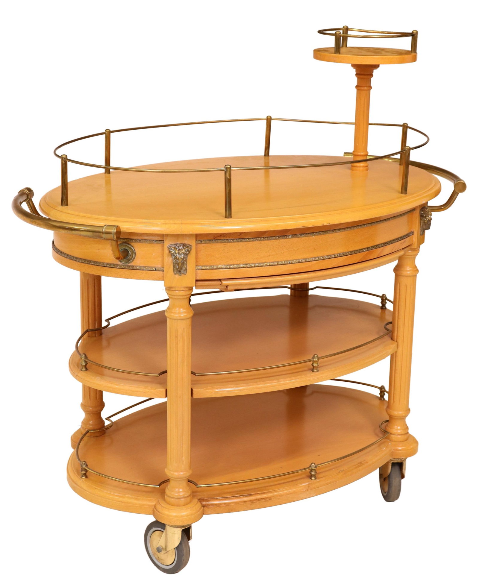 FRENCH MULTI-TIERED DESSERT CART SERVICE TROLLEY: French dessert cart/ service trolley, 20th c., having four tiers, gilt metal accents with ram's mask, on casters, approx 46"h, 44.5"w, 27.75"d Start Price: $350.00
