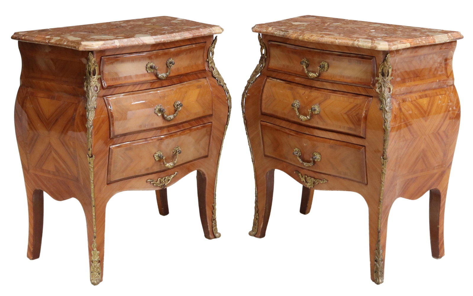 (2) FRENCH LOUIS XV STYLE MARBLE-TOP NIGHTSTANDS: (pair) French Louis XV style matched veneer nightstands, early 20th c., each having shaped marble top, over conforming case fitted with three drawers, gilt metal mounts, rising on flared feet, ending 