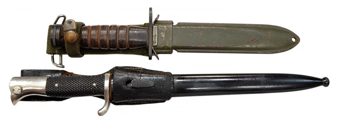 (2) U.S. W.R. CASE M4, GERMAN PUMA, WWII BAYONETS: (lot of 2) U.S. and German WWII bayonets: (1) W.R. Case U.S. Model M4 bayonet fighting knife, made for use with M1 carbine, marked at cross guard, leather handle, 11.5", housed in green metal USM8 she