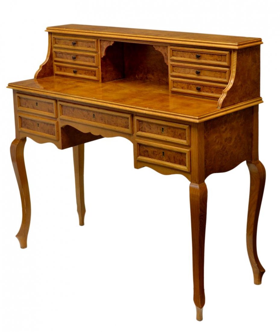 LADIES WRITING DESK, NORTHERN SPAIN: Ladies Karelian birch writing desk, Northern Spain, 20th c., an open six drawer gallery resting on the writing surface, six lower drawers all rising on dainty cabriole legs with arrow feet, 37.25"h, 4