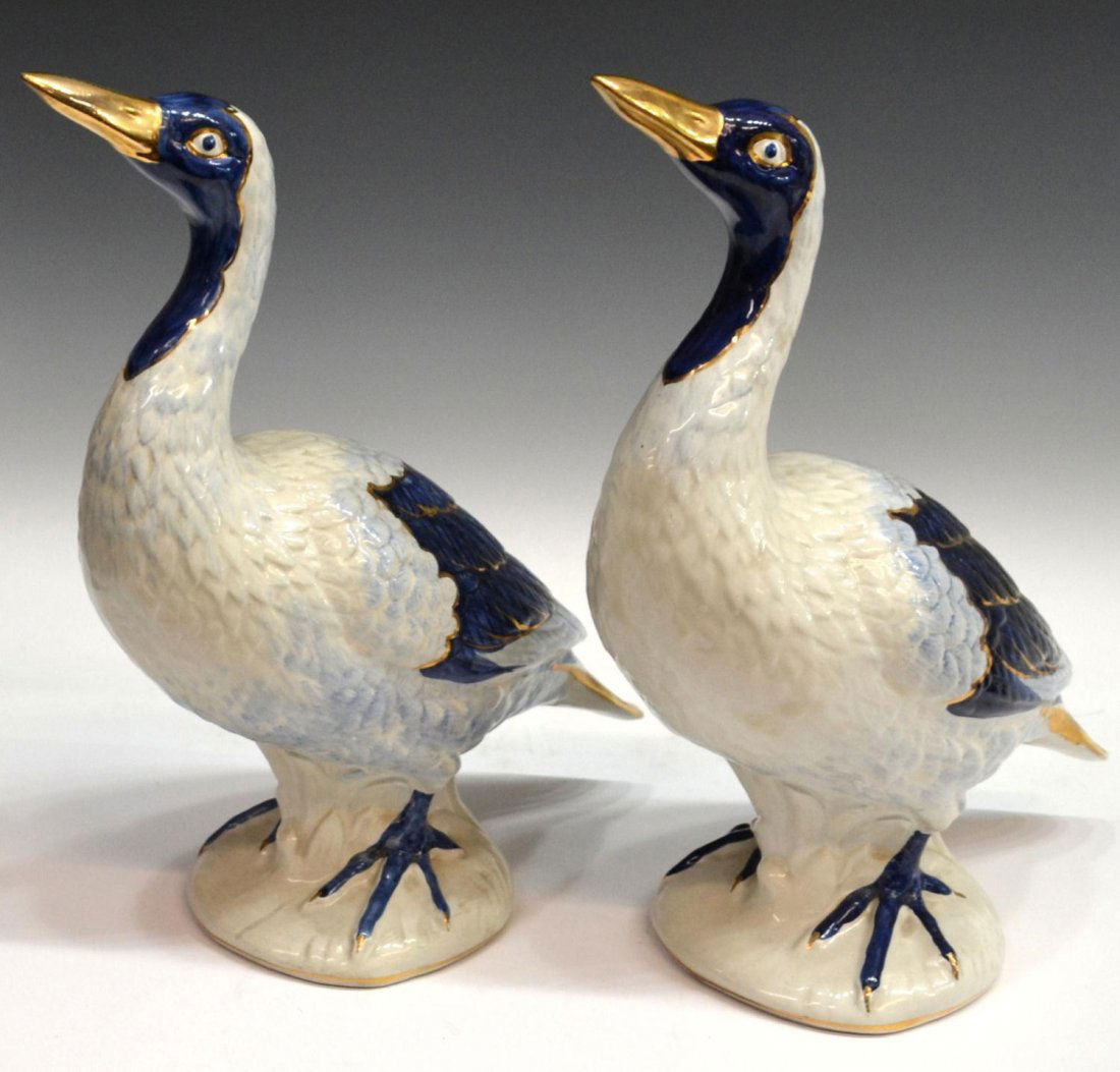 A PAIR OF LARGE GLAZED CERAMIC DUCKS: (lot of 2) Glazed ceramic ducks with gilded beaks, 15.5"h, 19"l, 7.25lbs total **Provenance: From the estate of film, television and theater star Pepe Rubio (Jose Rubio Urrea, Spain, 1931-2012)** Star