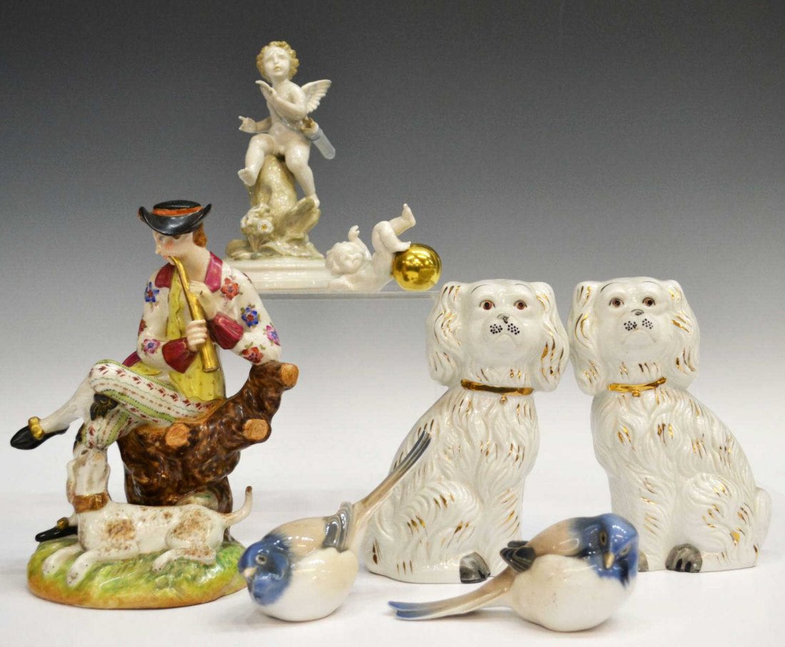 (7) GROUP OF CONTINENTAL & OTHER PORCELAIN FIGURES: (lot of 7) Collection of porcelain figures: (pair) Bing & Grondahl birds, 5"l; (1) winged cherub with quiver and book, seated upon a tree trunk, oval base marked Made in Spain, other illegible marks, 