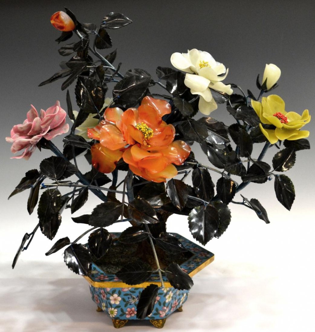 LARGE CHINESE HARDSTONE & CLOISONNE ENAMEL TREE: Large Chinese hardstone tree, carnelian and jade flowers and flower buds bloom from a leafy tree, floral pattern cloisonne enamel vase of hexagonal form, some roughness and chips, approx. 18.5"h, 10lb