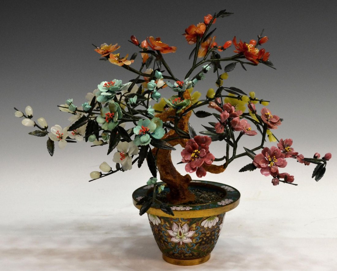 CHINESE HARDSTONE & CLOISONNE ENAMEL TREE: Chinese hardstone tree, flowering branches of carnelian, turquoise, jade, etc., set in circular floral cloisonne enamel planter, approx. 14"h, 4lbs Start Price: $100.00