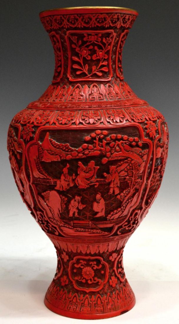 LARGE CHINESE CINNABAR BALUSTER VASE: Large Chinese cinnabar vase of baluster form, the body with figural scenes in reserve on a textured ground, floral decoration and running ruyi-head borders, slight chips to body, 18.5"h, 10.75lbs Star