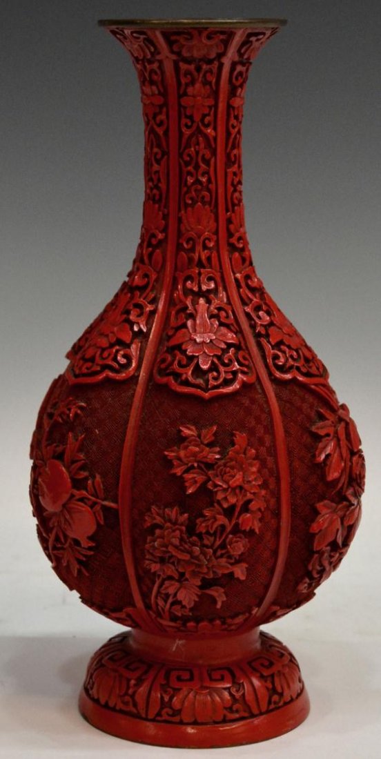 CHINESE CINNABAR VASE: Chinese cinnabar vase, flared rim and long neck on globular body having six lobes, decorated with foliage on patterned ground, overall some chipping,12.5"h, 4.5lbs Start Price: $100.00