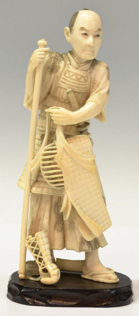 JAPANESE IVORY OKIMONO, KENDO MASTER: **This item will not be shipped Internationally**Japanese ivory figure (okimono), Taisho/early Showa period, well carved and pierced as a master of kendo, martial art of sword-fighting, standing in pa