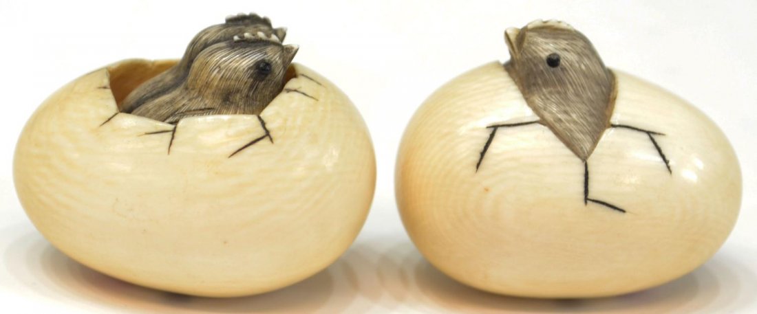 JAPANESE IVORY NETSUKE, SHOWA PERIOD: (lot of 2) Japanese carved ivory netsuke, Showa period, each of hatching chicks with inlaid eyes and dark pigment accents, both signed Mitsuhiro above a red seal: (1) pair of chicks moveable in the eg