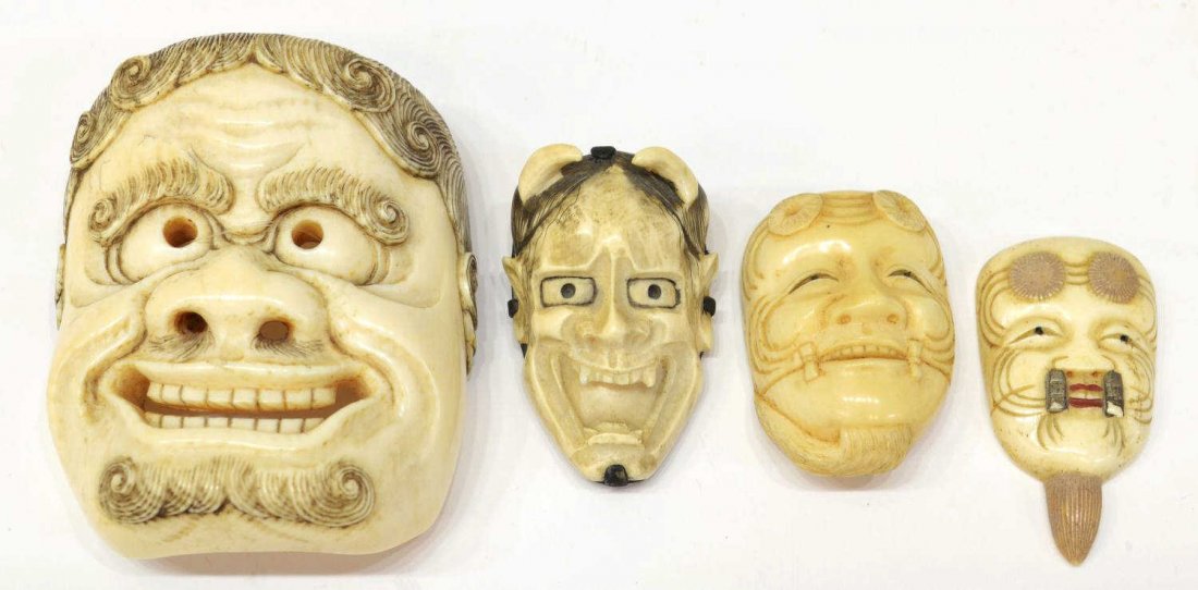 (3) IVORY AND ONE BONE JAPANESE MASK CARVINGS: **This lot will not be shipped Internationally** (lot of 4) Japanese carving of masks, including a large ivory mask of a South Sea Islander, with stained accents; an ivory mask of the female demon Han